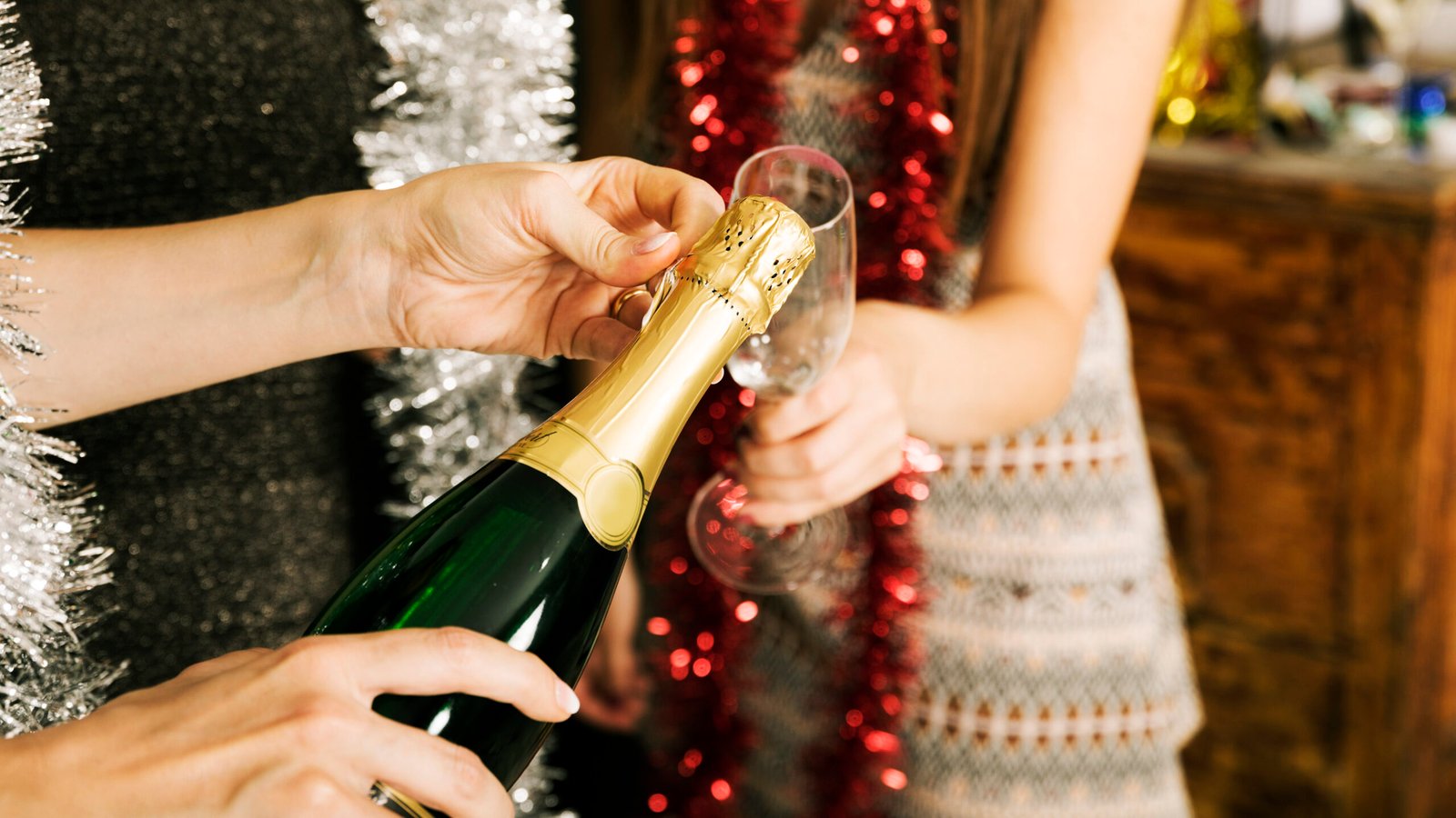 close-up-girls-with-champagne-new-year-party-scaled.jpg